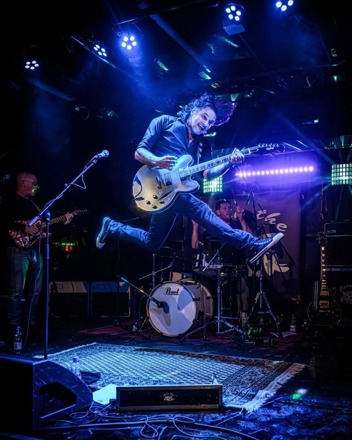 Roland Brons in actie op het podium